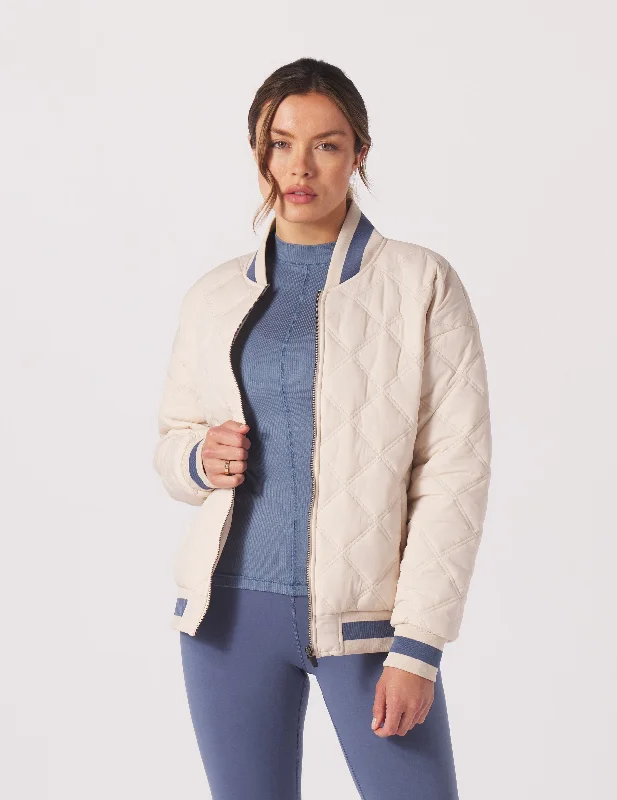 Varsity Jacket: Oatmilk/Washed Blue Snapped Jacket Toggled Jacket Drawstring Jacket